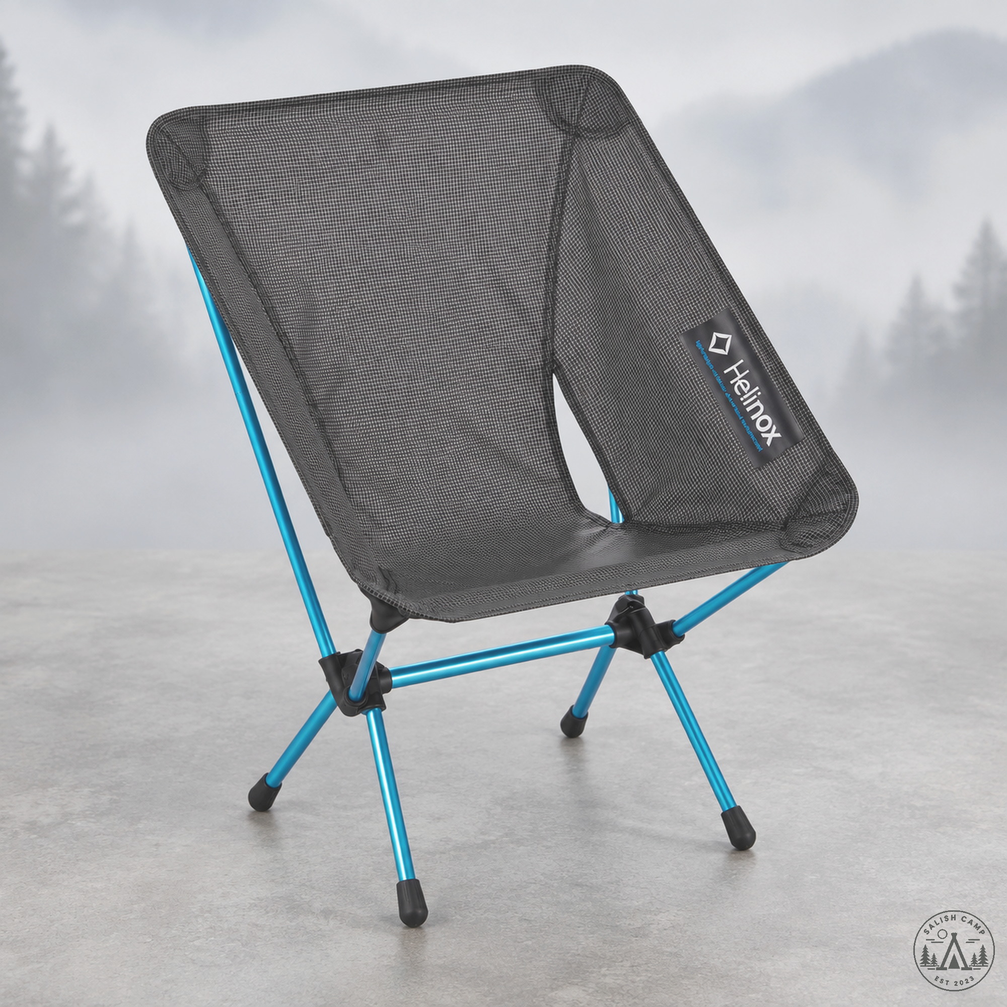 Helinox Chair Zero Black 10551R1 assembled — black ripstop seat on cyan green-anodized DAC poles