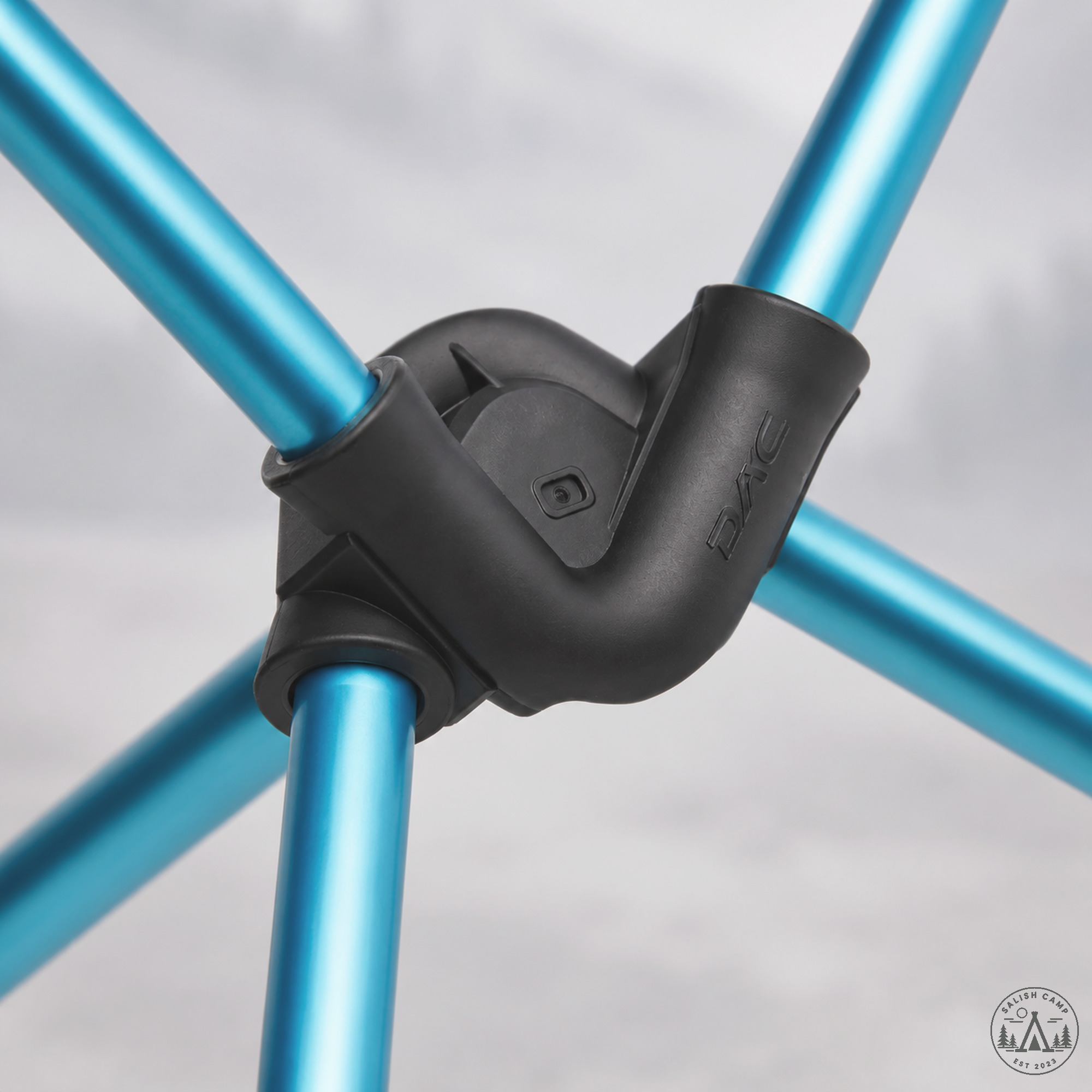 Helinox Chair Zero black resin hub with DAC emboss and cyan shock-corded poles