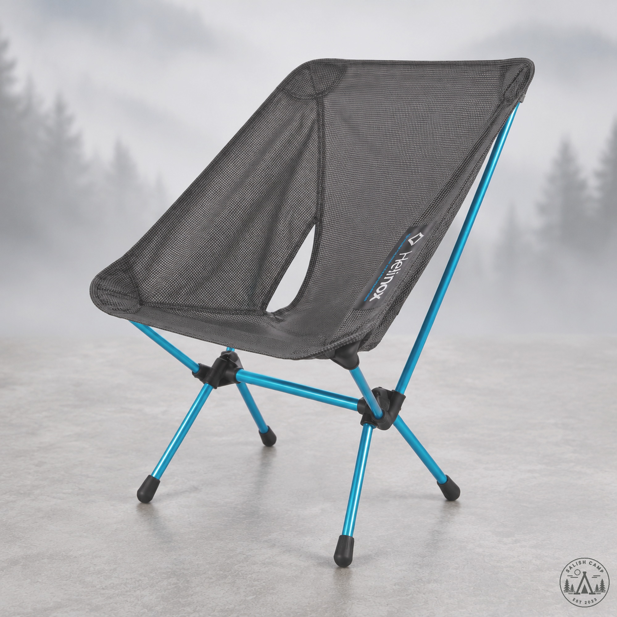 Helinox Chair Zero Black three-quarter view showing bucket seat and cyan DAC frame