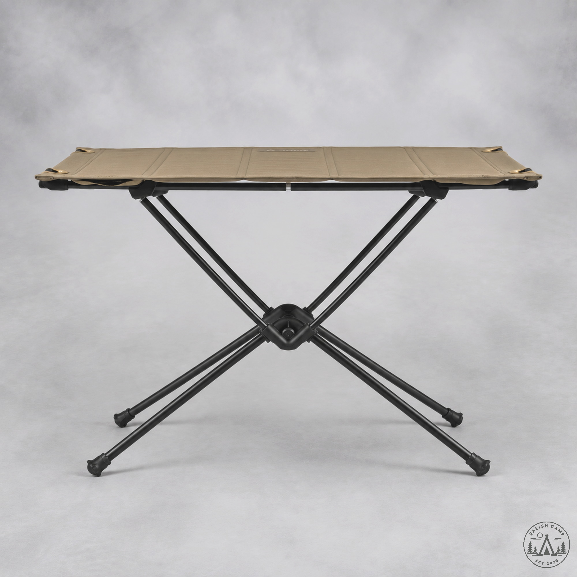 Helinox Table One Hard Top Coyote Tan side profile showing 15-inch height and matte-black DAC X-legs