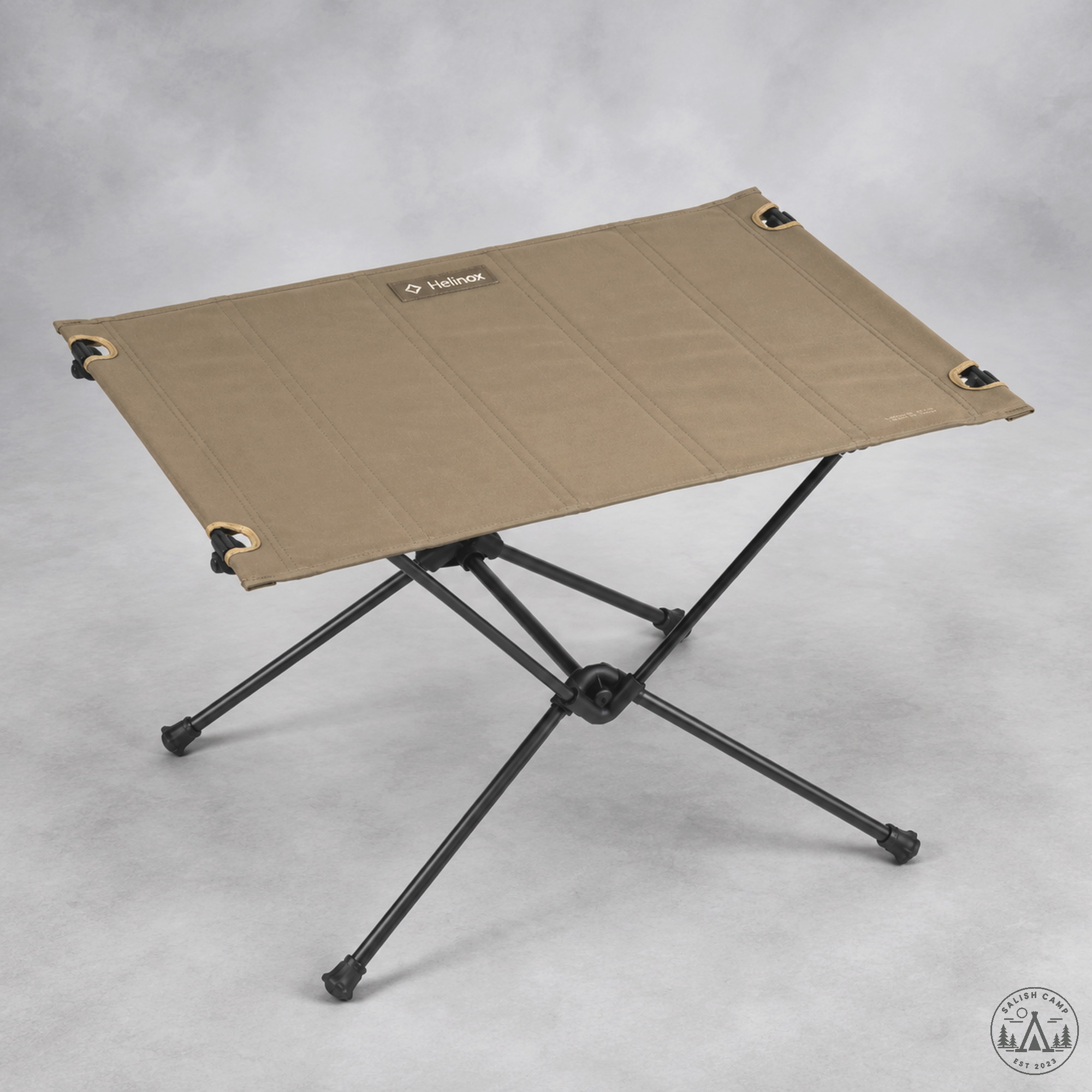 Helinox Table One Hard Top Coyote Tan 13893 assembled — tan hard top on matte-black DAC frame