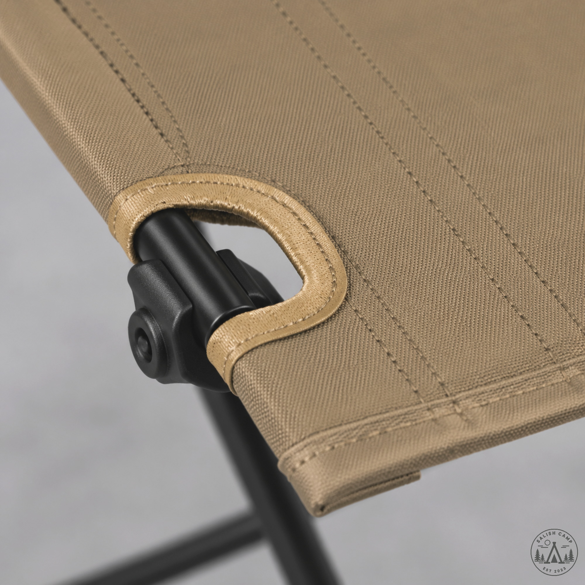 Helinox Table One Hard Top Coyote Tan corner socket with matte-black pole fully seated