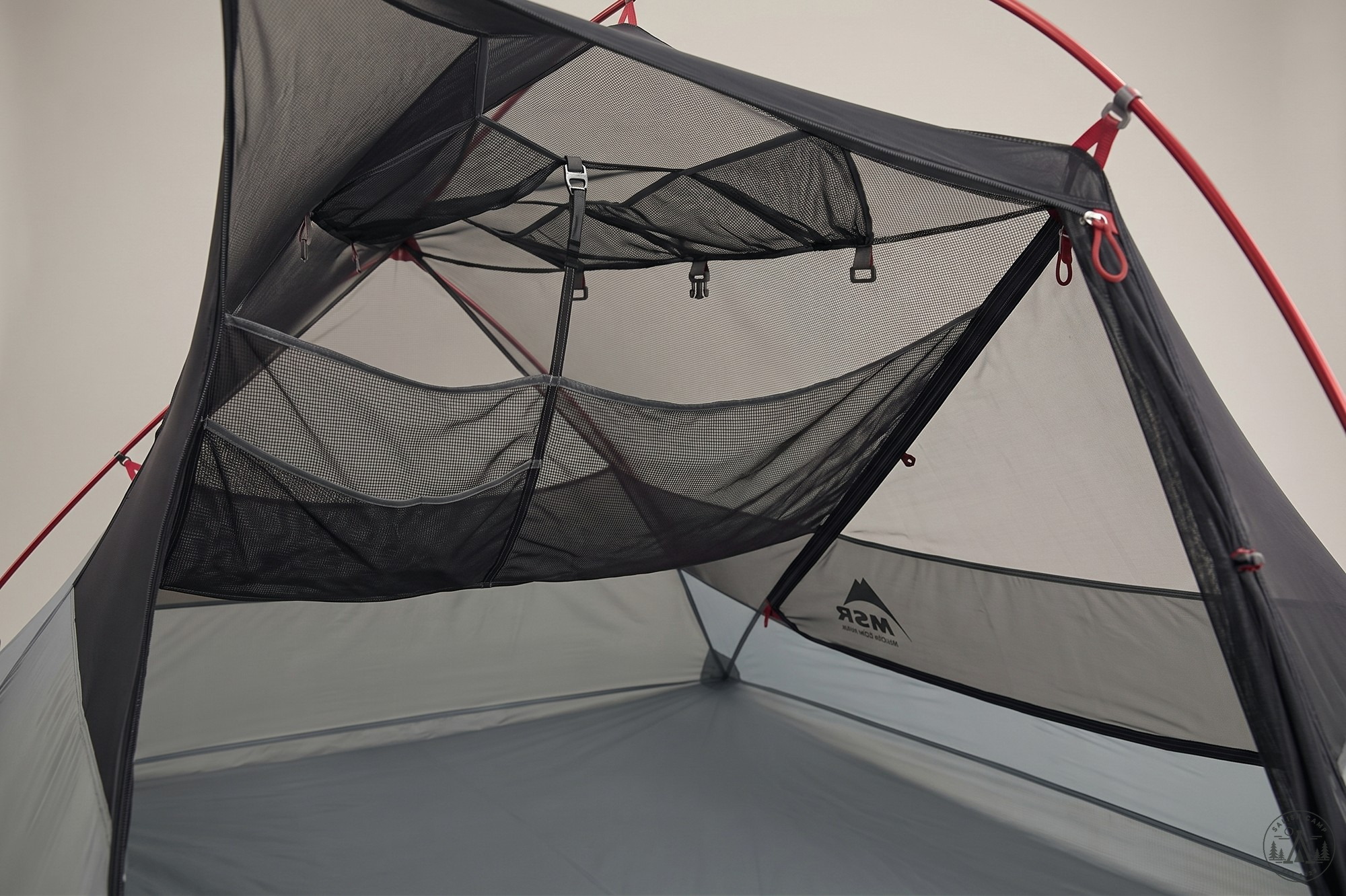 Tech-friendly pockets, cable ports, lofts, and clothesline