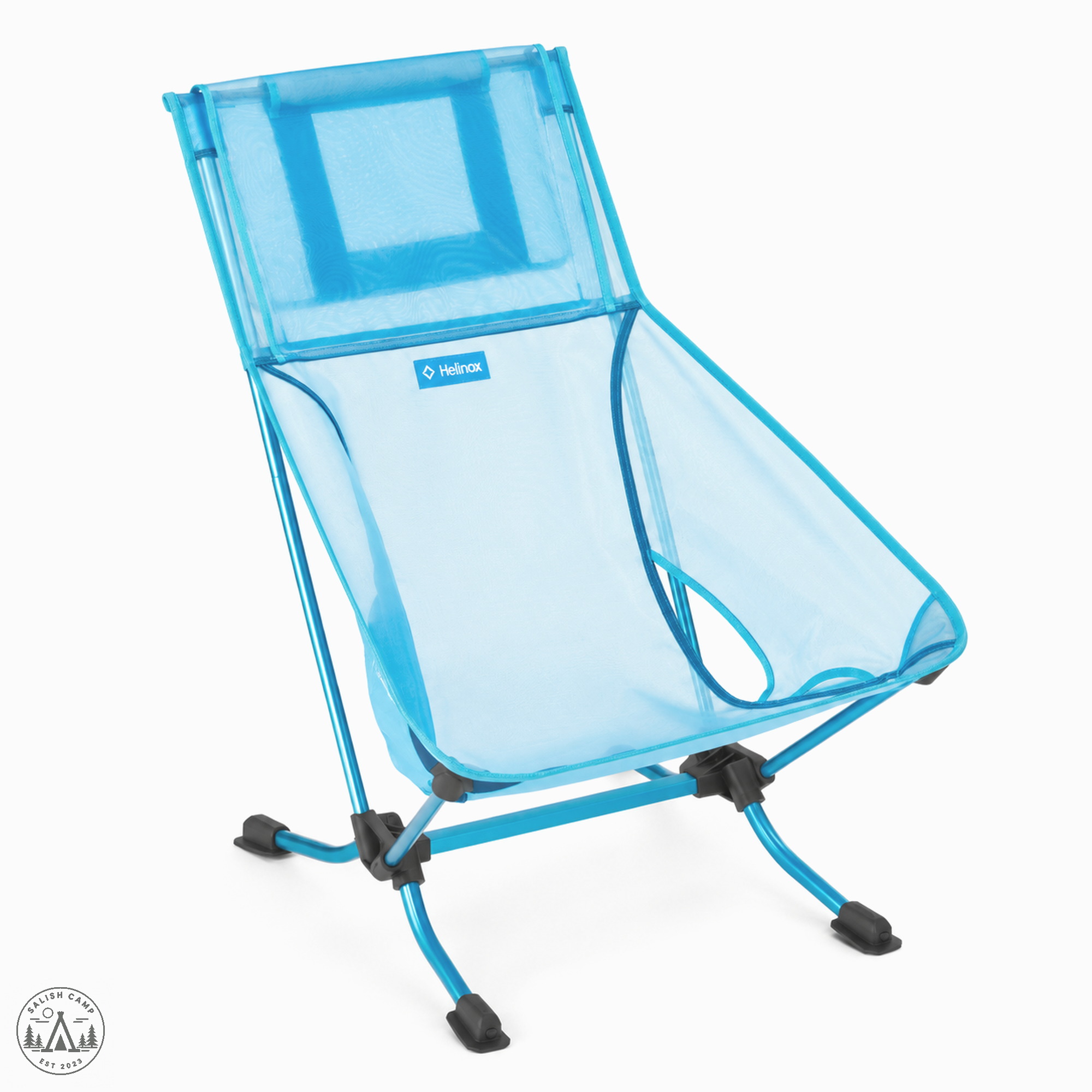 Helinox Beach Chair (re) in Blue Mesh, front three-quarter view on white