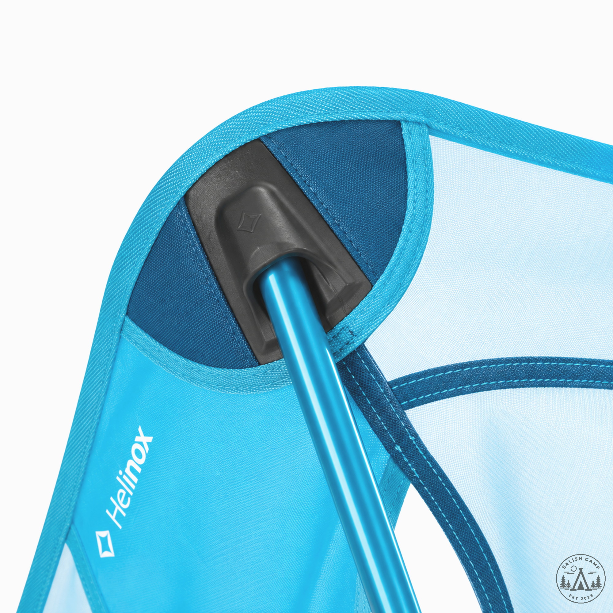 Close-up of a molded black corner pole pocket on the Blue Mesh chair with a cyan pole seated in it