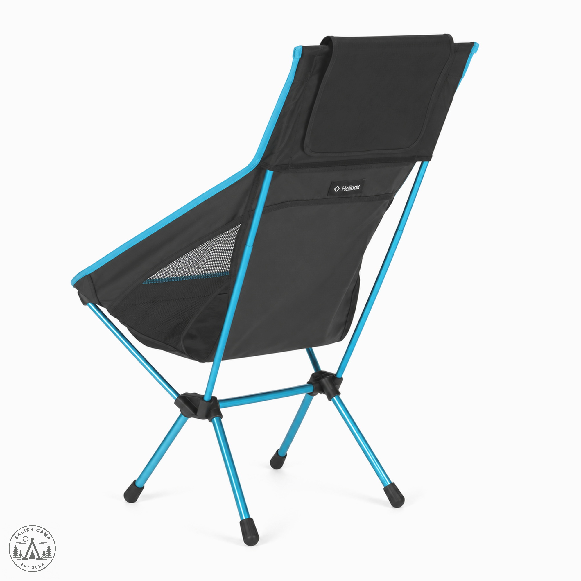 Back three-quarter view of the Helinox Chair One High-Back (re) in Black, with cyan poles and black hubs
