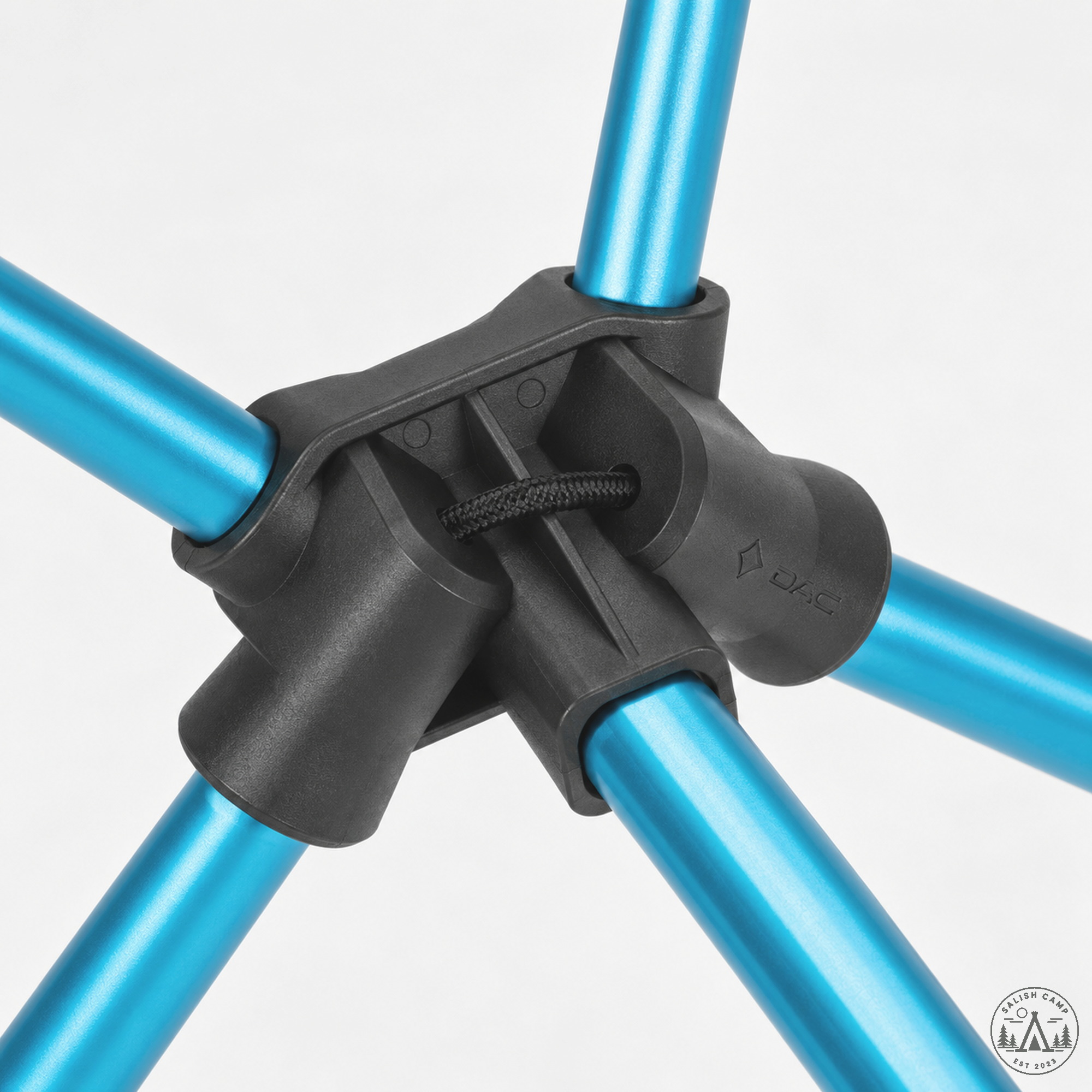 Close-up of a black hub on the Black Chair One High-Back (re) joining four cyan poles, with the shock cord visible inside