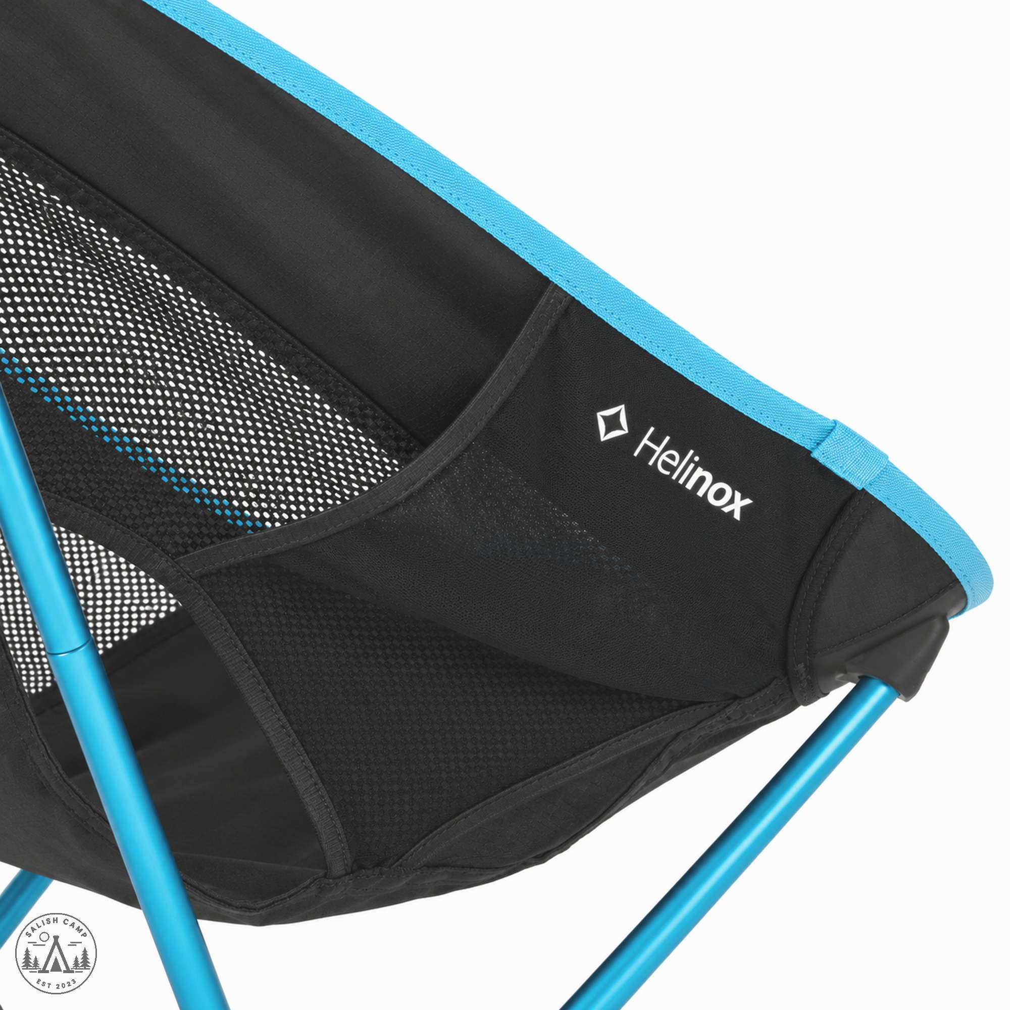 Close-up of the side pocket on the Black Chair One (re), printed with a white Helinox wordmark