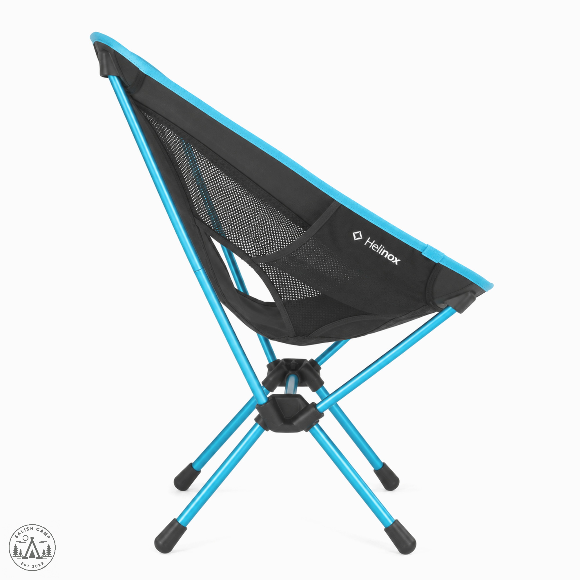 Side profile of the Helinox Chair One (re) in Black on white, with cyan poles crossing at black hubs