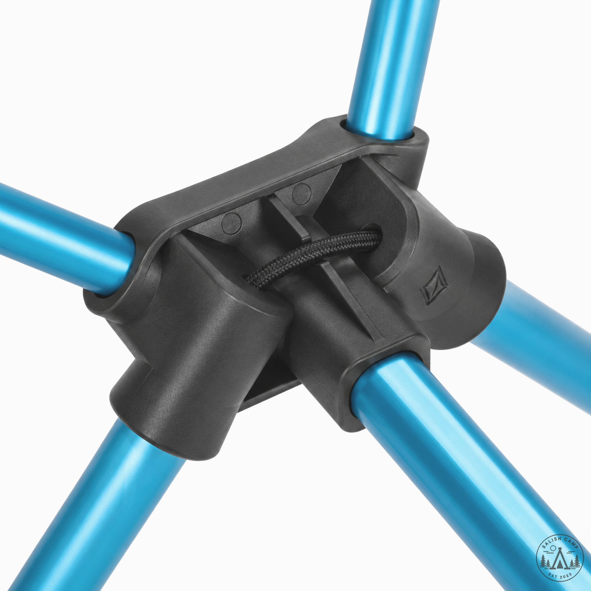 Close-up of a black hub on the Black Chair One (re) joining its cyan poles, with the shock cord visible inside