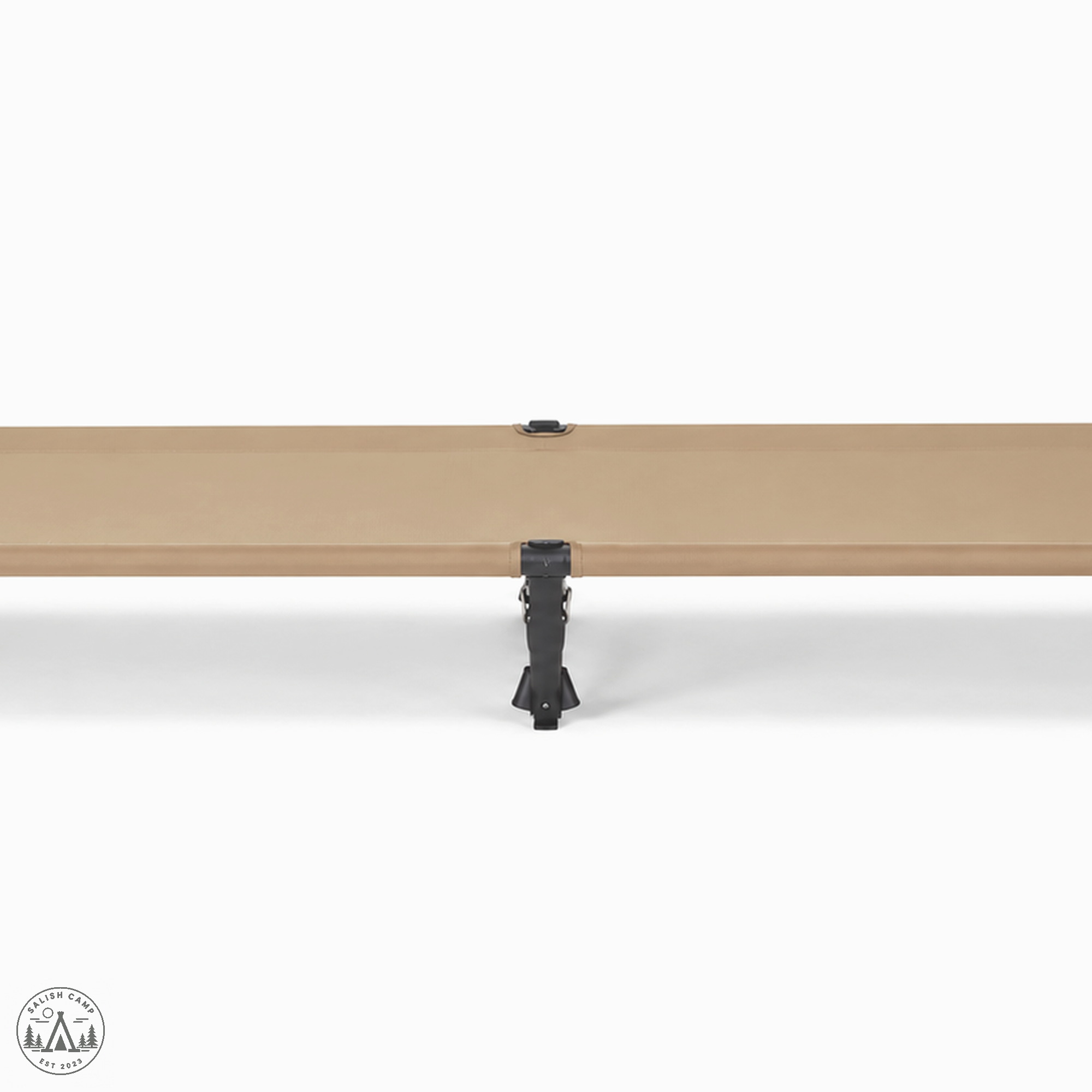 Side profile of the Helinox Cot One Convertible in Coyote Tan, showing the middle leg and taut deck