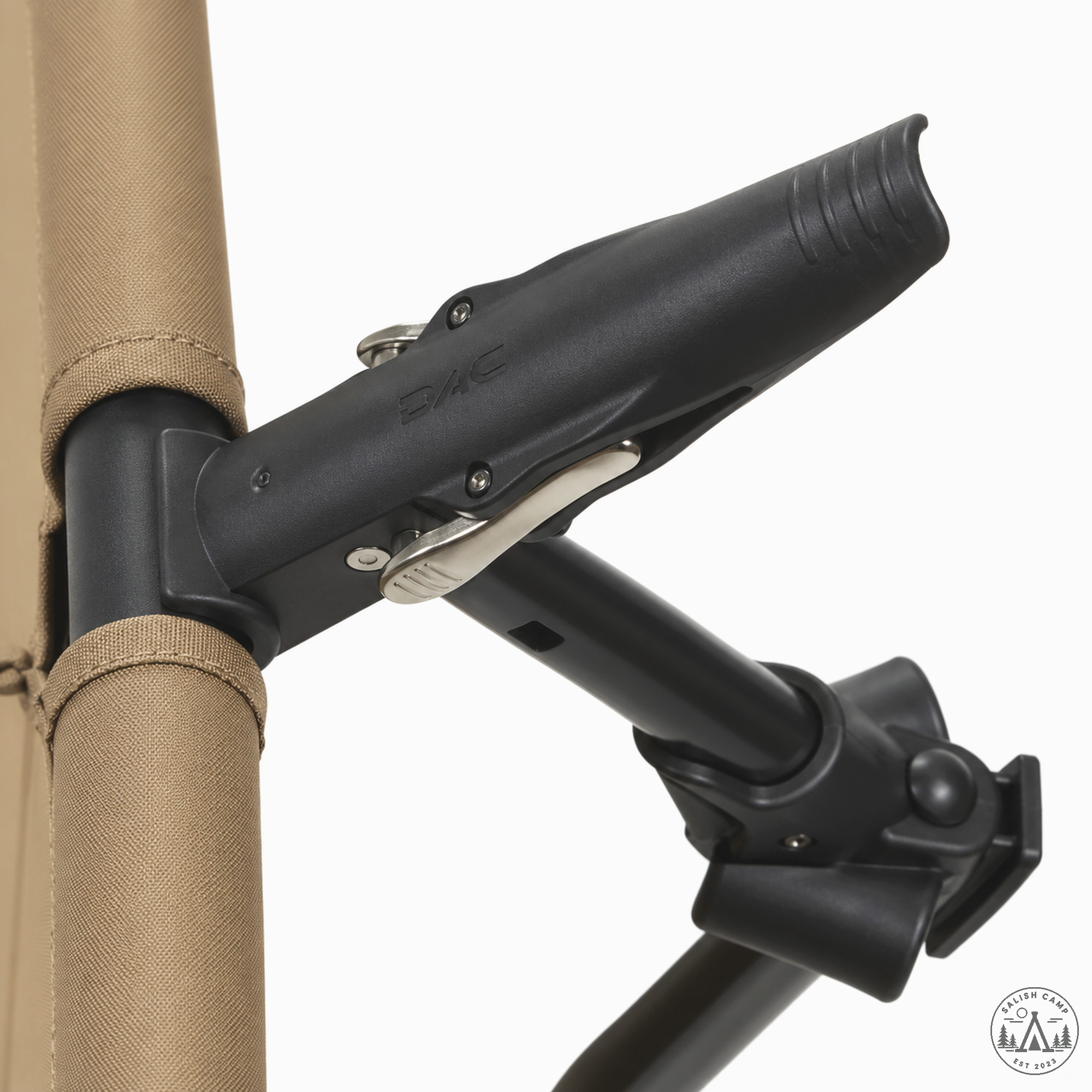 Close-up of the lever-lock tensioning housing on the Coyote Tan Cot One Convertible