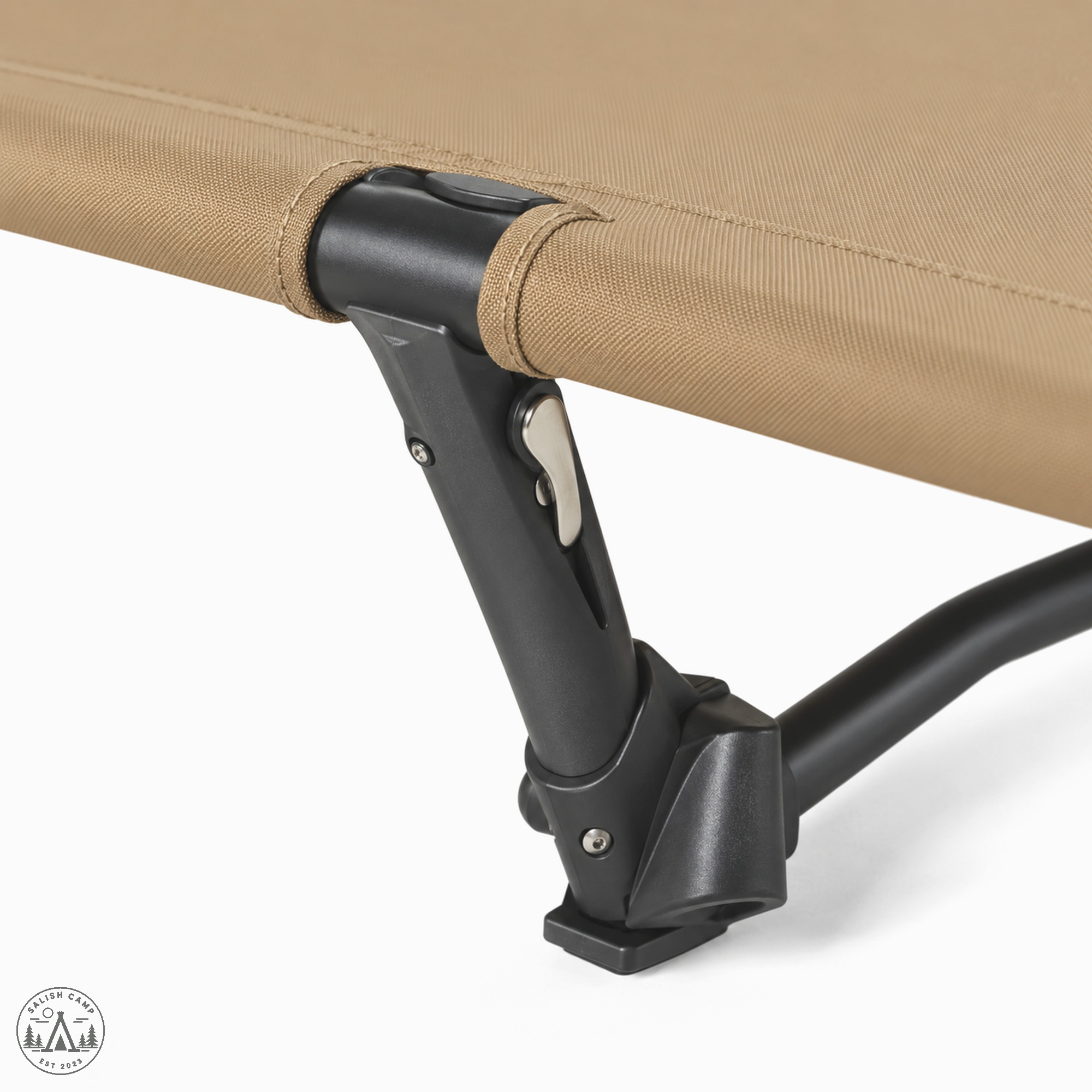 Close-up of a leg and lever-lock junction on the Coyote Tan Cot One Convertible frame