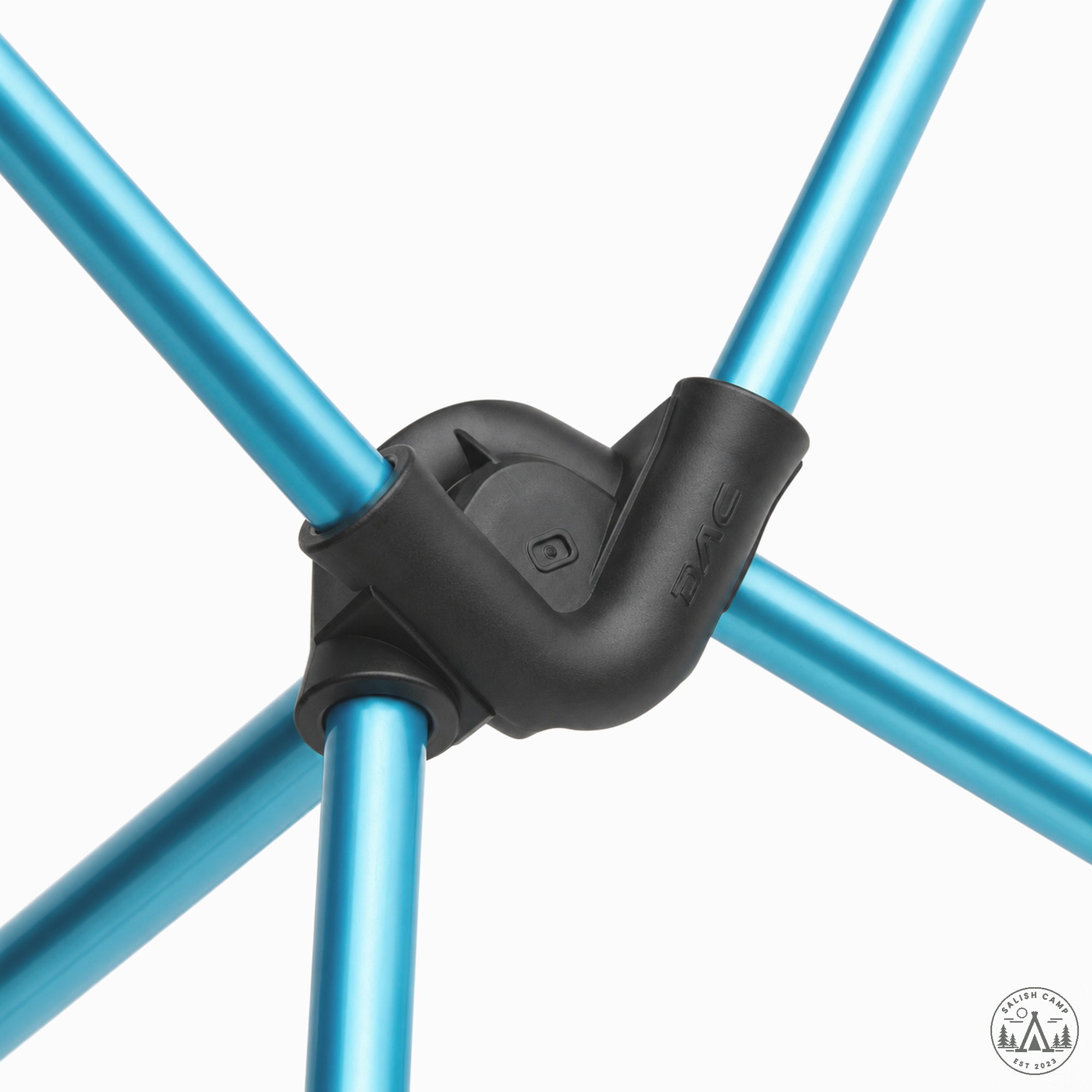 Close-up of a black resin hub joining four cyan shock-corded poles