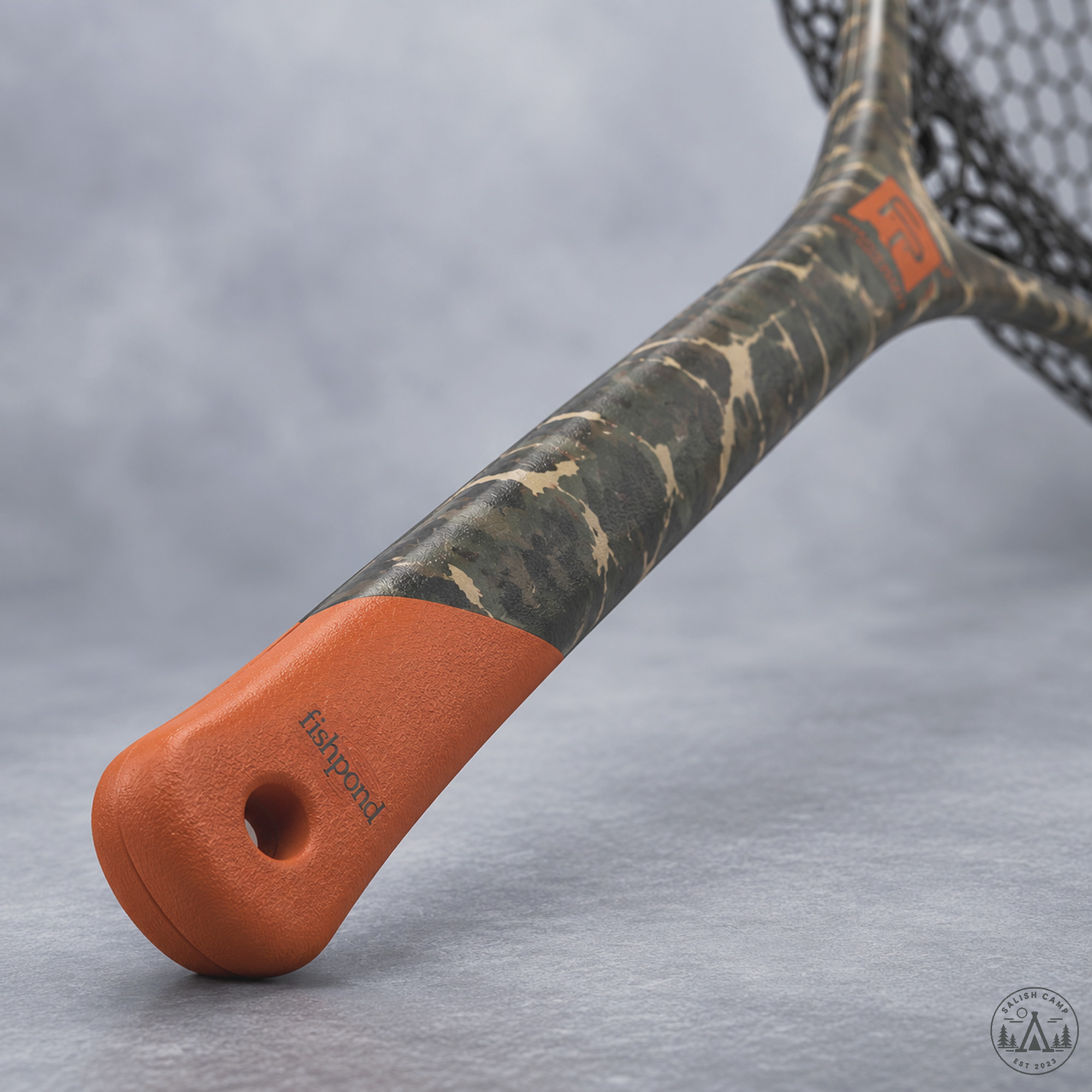 Orange grip and lanyard hole on the El Jefe handle