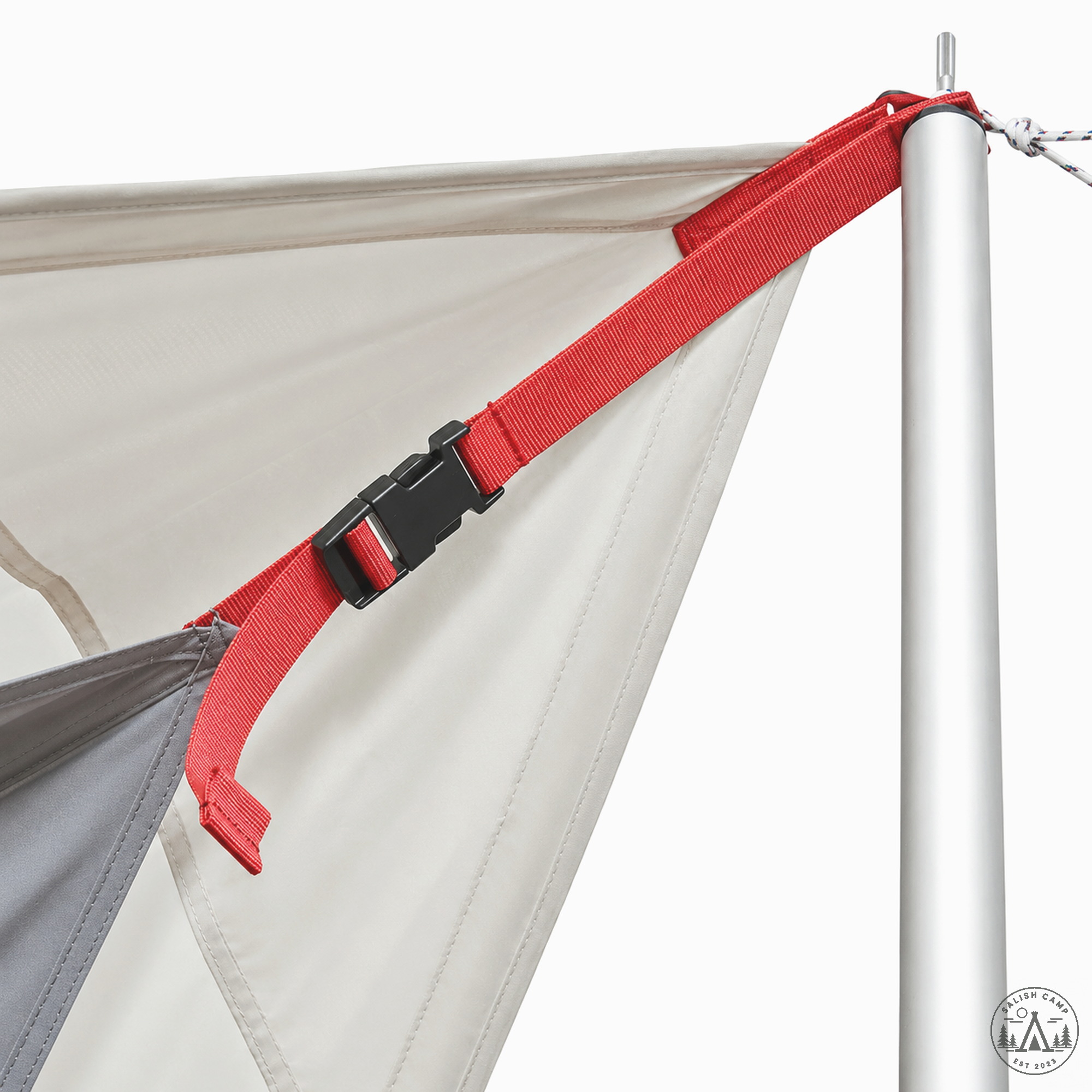 Red webbing and a black buckle on one silver wing pole of the ivory hexa
