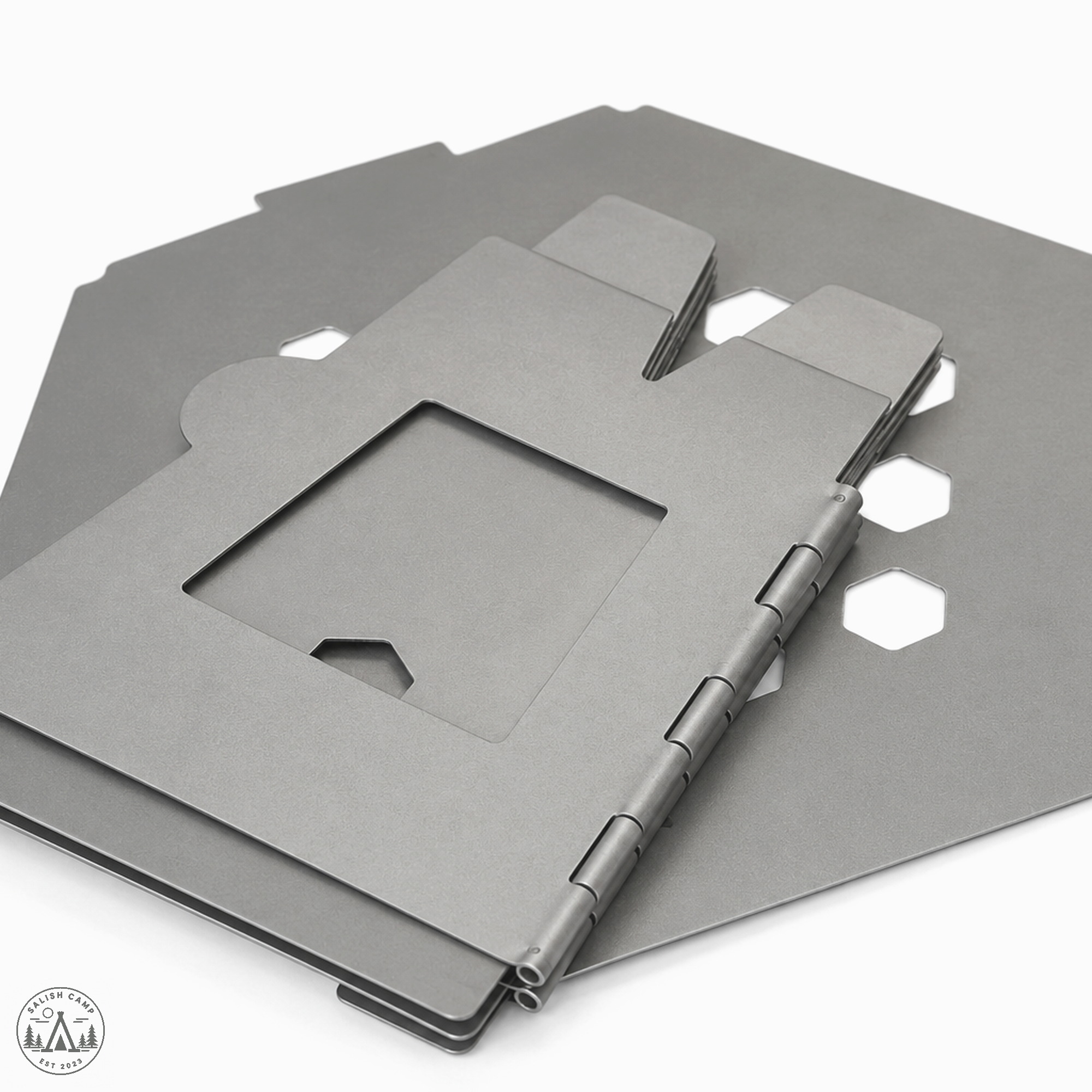 Hexagon 2 collapsed flat into nested titanium panels
