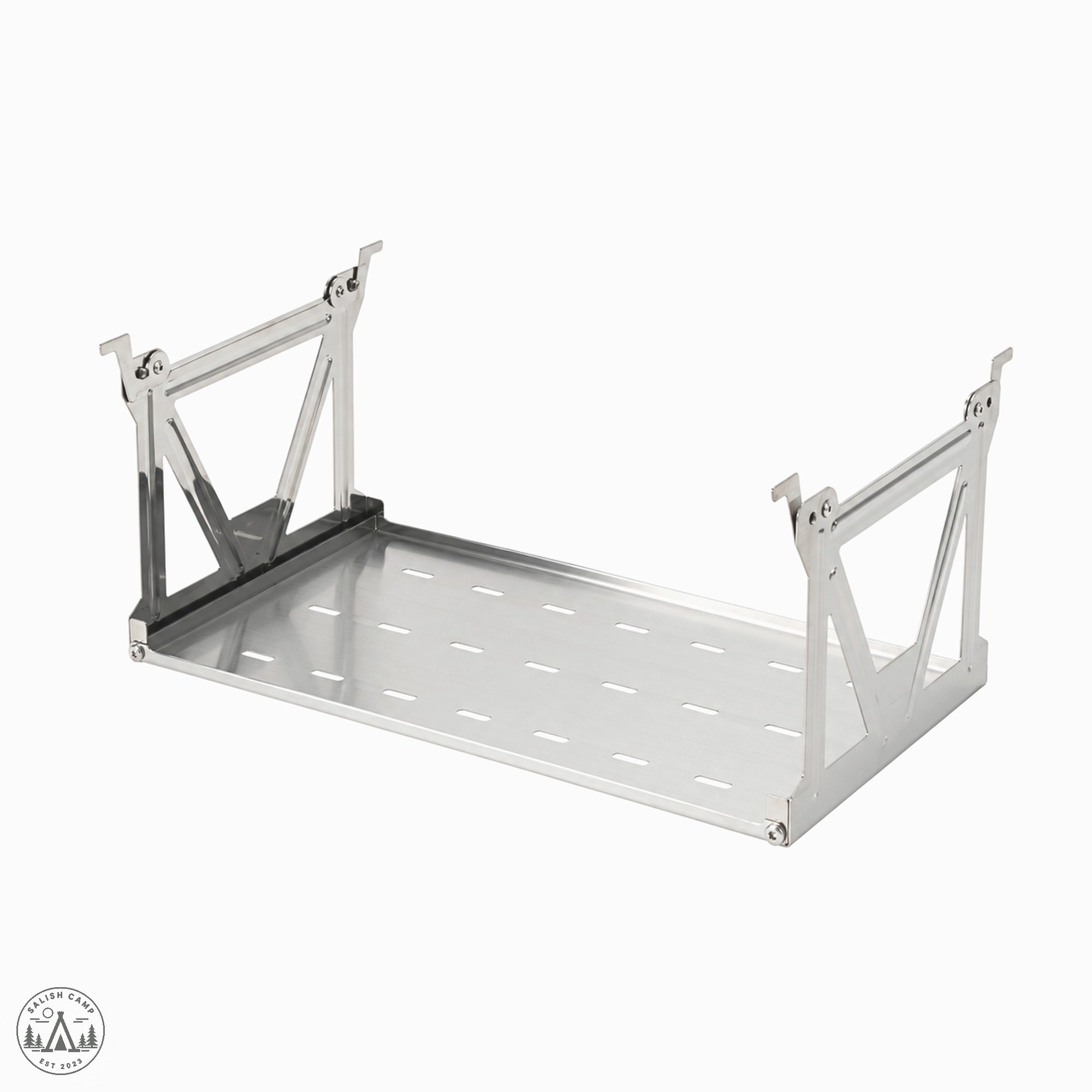 Open stainless Snow Peak Shallow IGT Hanging Shelf on white, with two end brackets and a slotted deck