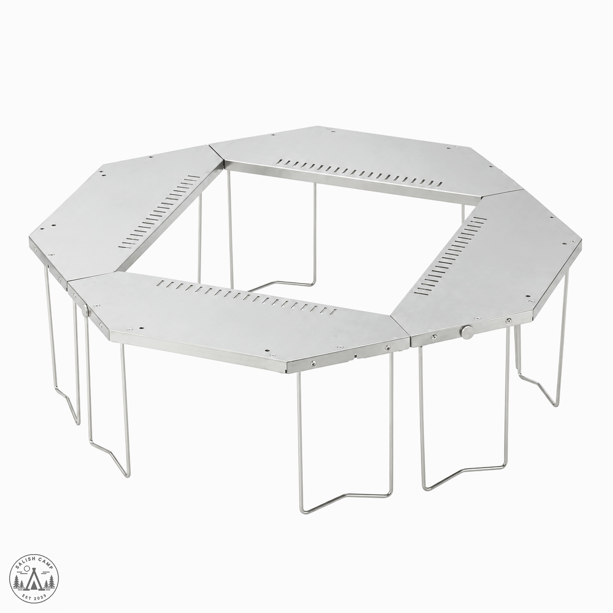 Snow Peak Jikaro Firering Table ST-050 on white, high three-quarter view of four stainless tops around a square opening