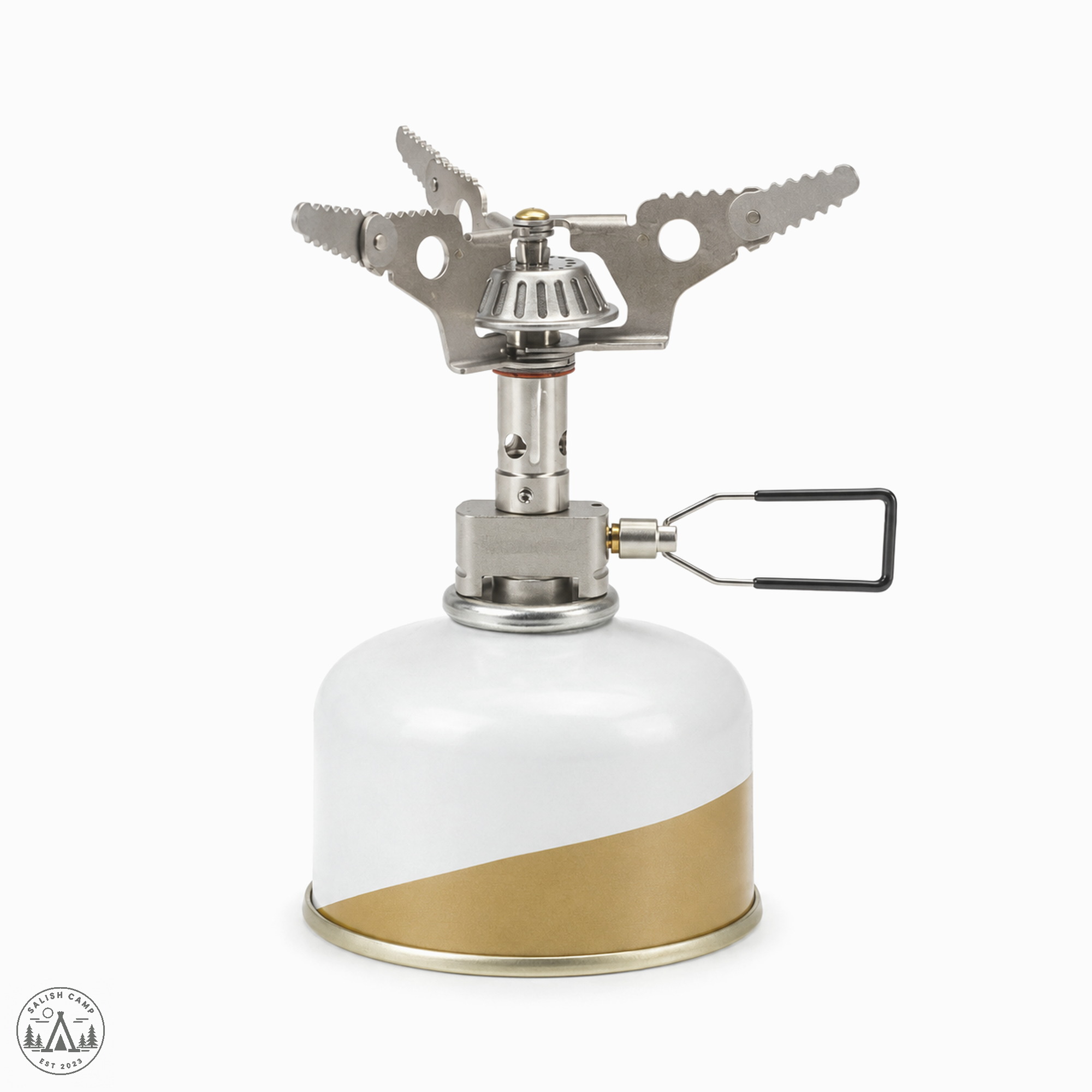 LiteMax titanium stove with the pot supports open, on an unlabeled white and gold canister