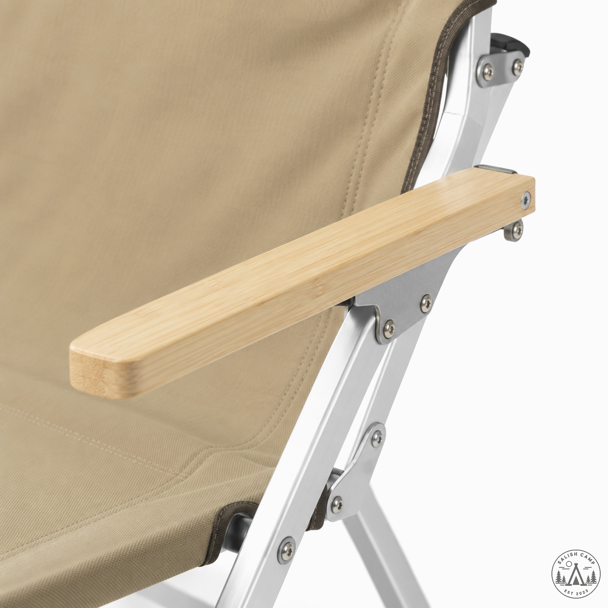 Close-up of one light wood armrest screwed to the silver frame of the Khaki chair