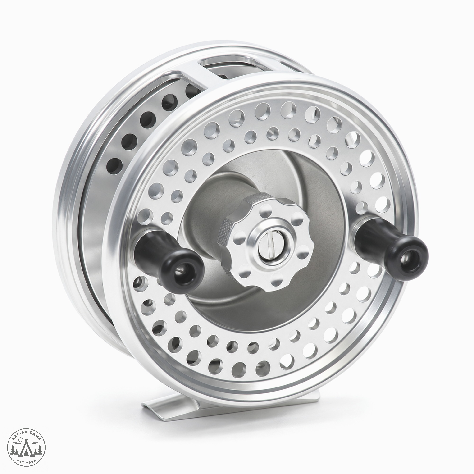 Clear Islander MR3 reel, three-quarter view of the spool face on white