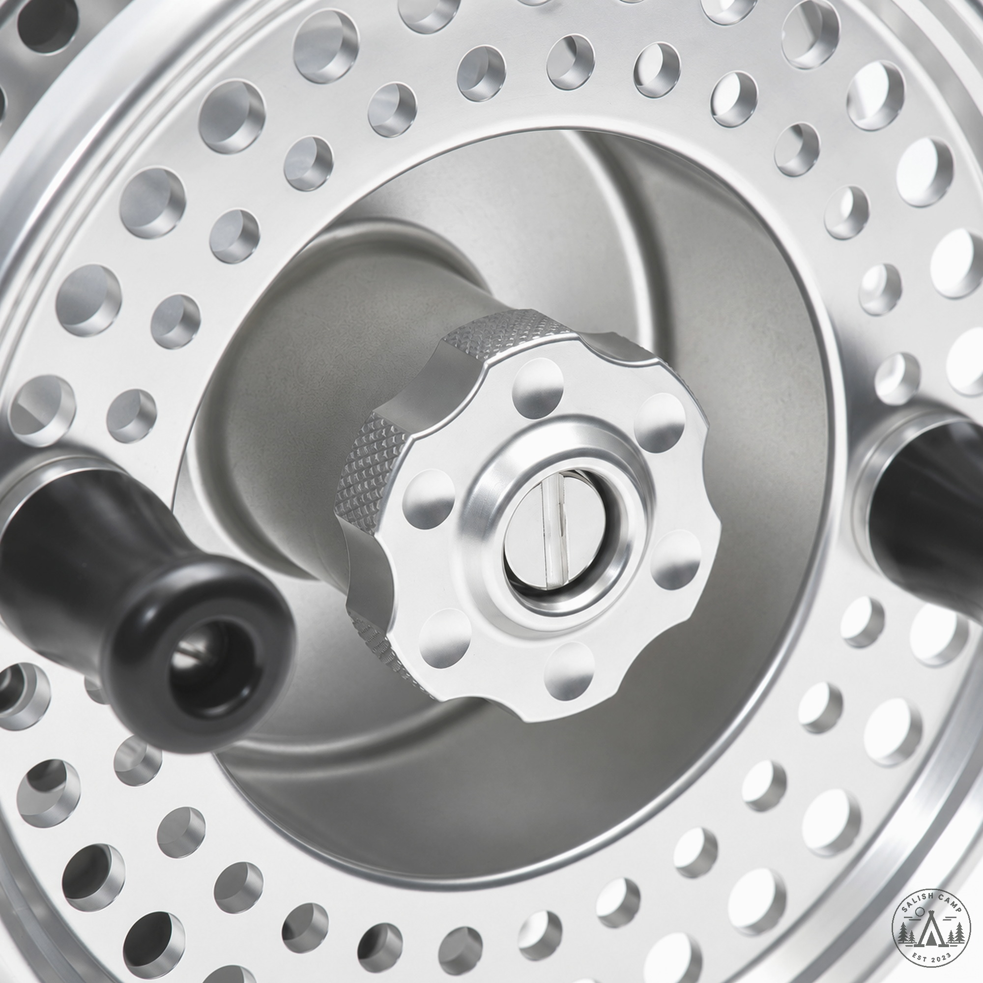 Close view of the scalloped drag knob on the Clear Islander MR3