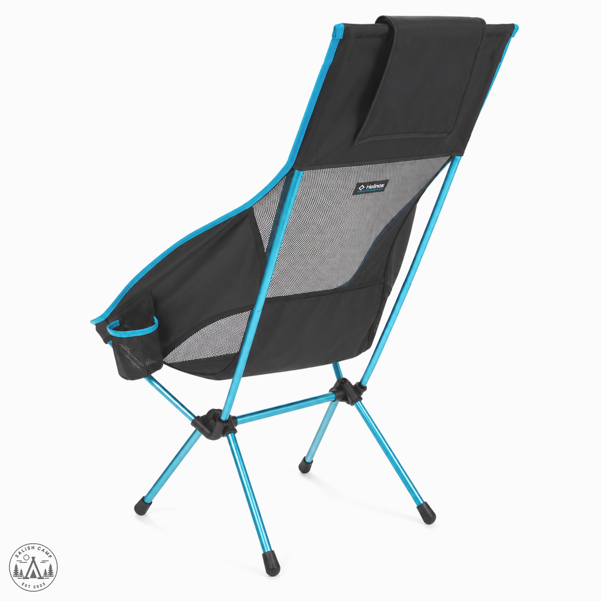 Back three-quarter view of the Helinox Savanna Chair in Black, with cyan poles and black hubs