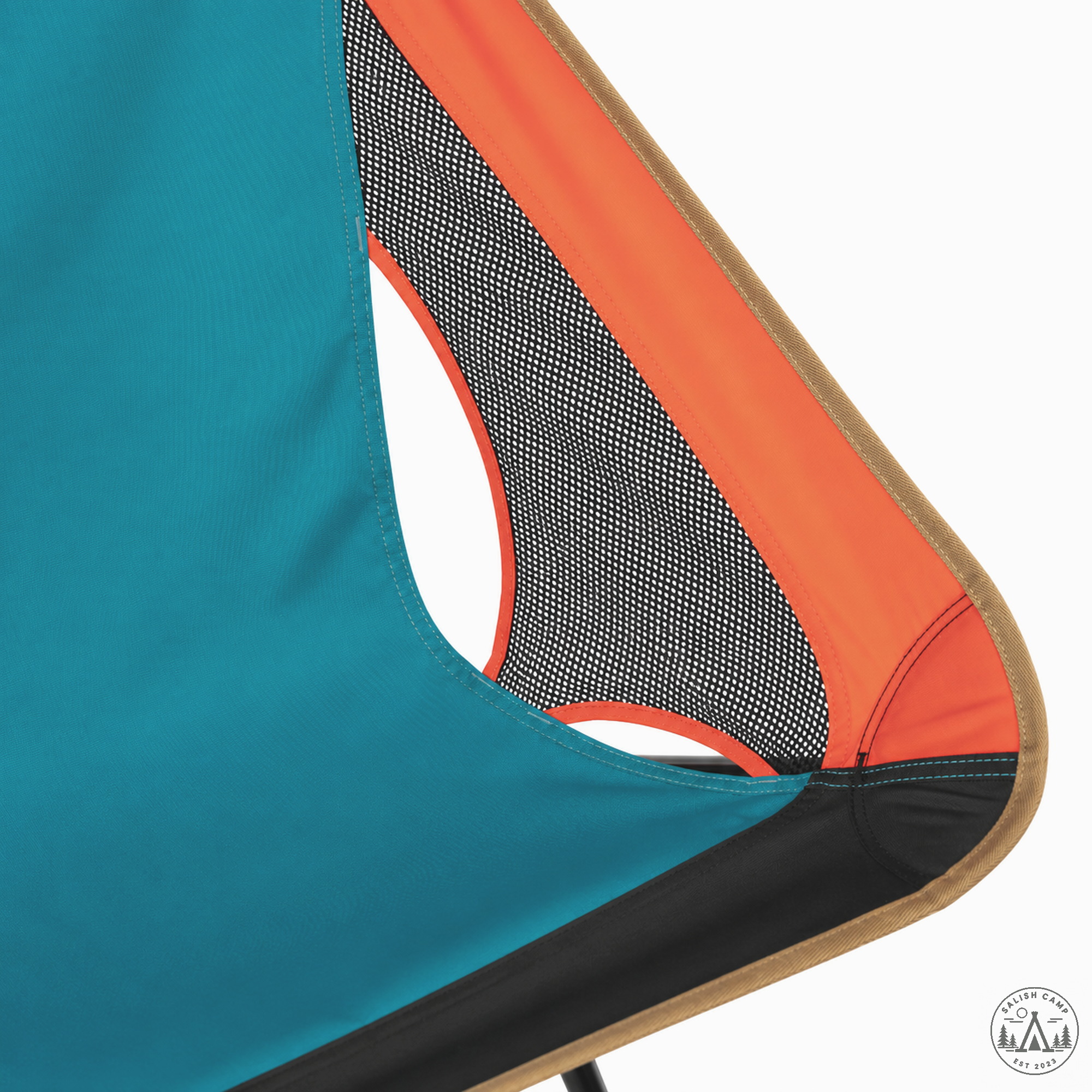 Close-up of the black mesh vent between the teal seat and the orange side panel