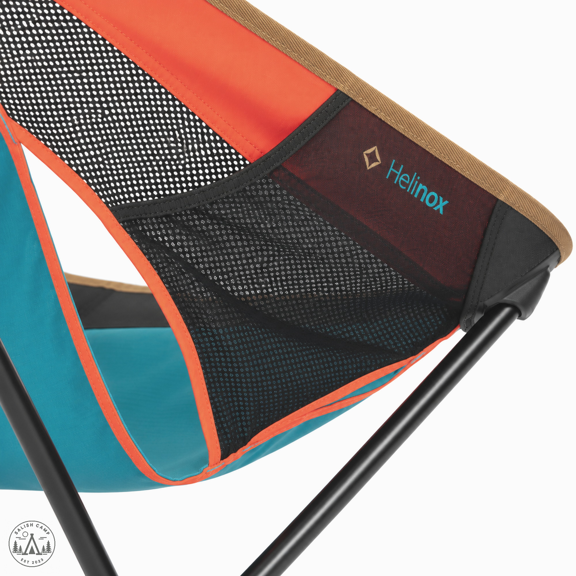 Close-up of the black mesh side pocket with orange piping and a teal Helinox wordmark