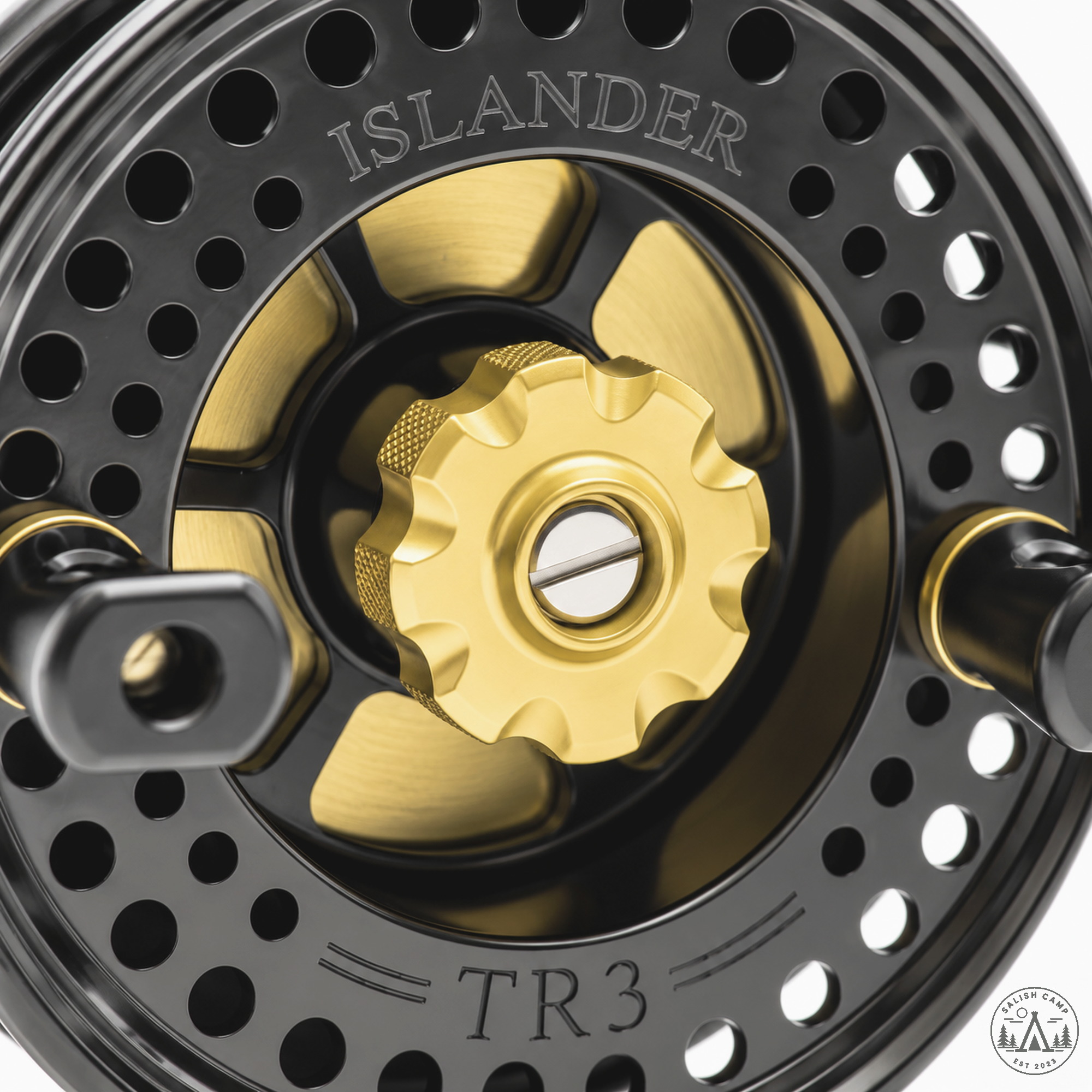 Close view of the gold drag knob on the black and gold Islander TR3