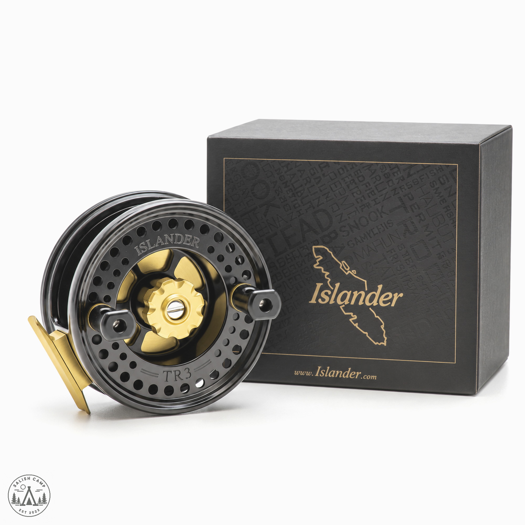 Black and gold Islander TR3 in front of a dark Islander retail box
