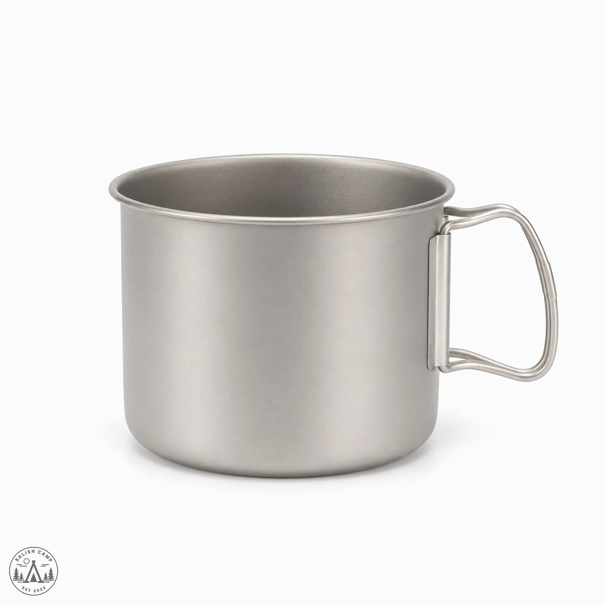 Open titanium Trek 1400 pot with the side handle extended and an empty interior