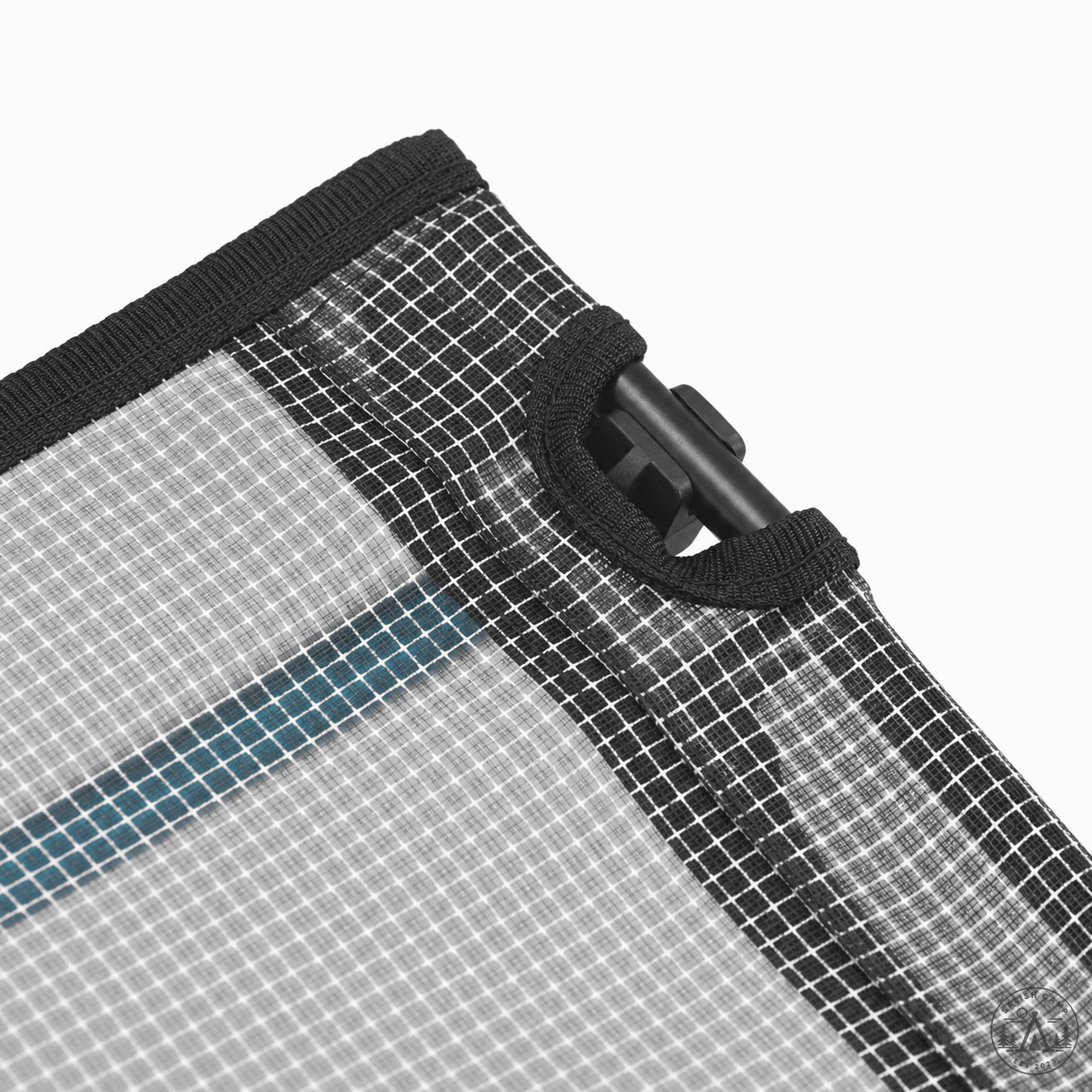 Close-up of a black-bound corner of the mesh top with a black plastic corner fitting