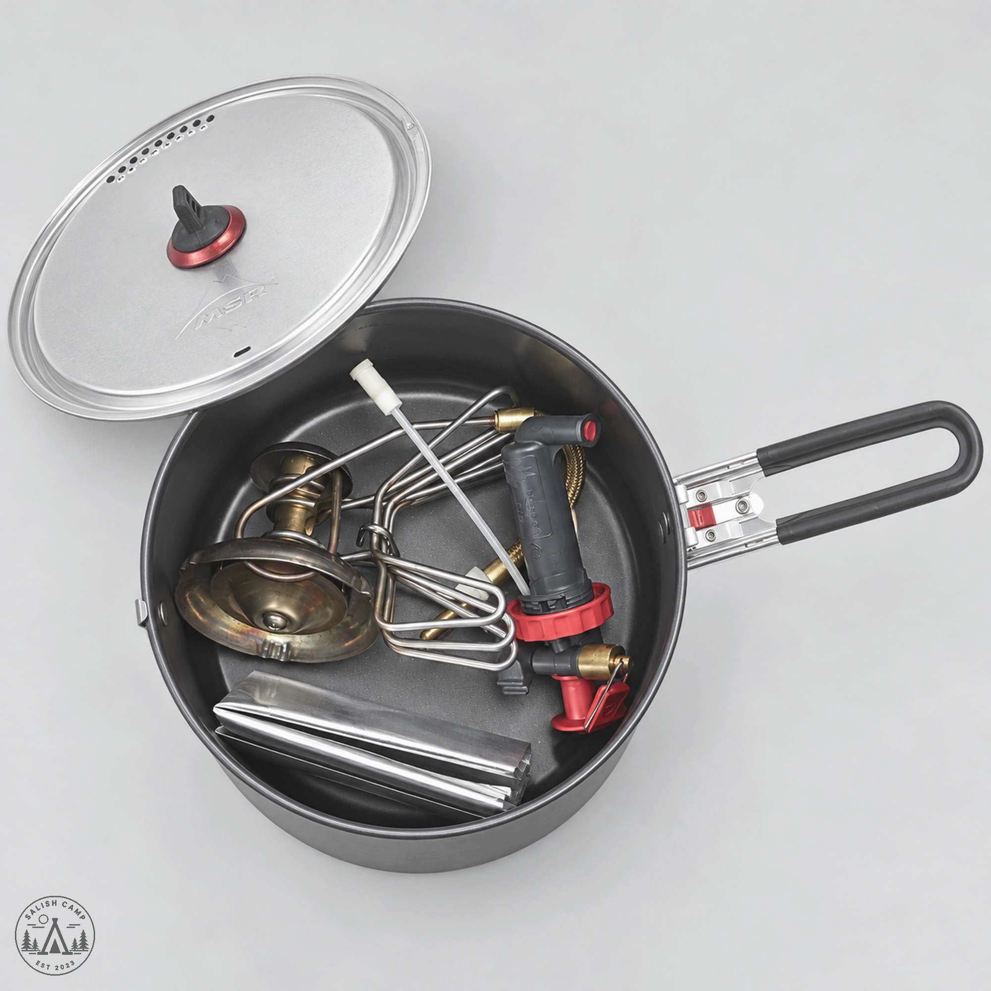 MSR WhisperLite and pump stowed inside a pot