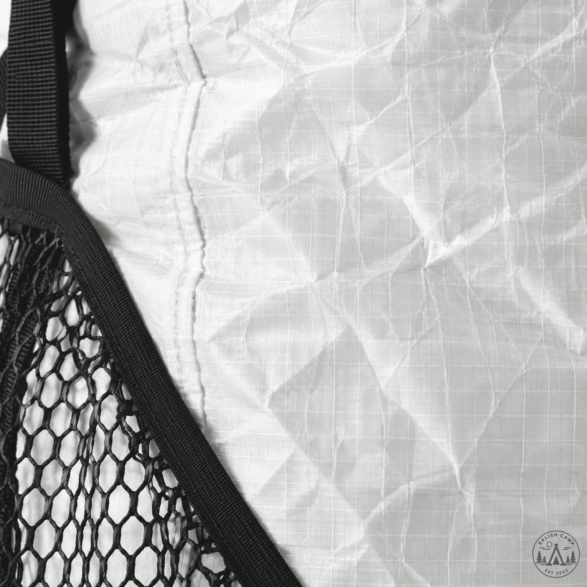 White Dyneema Woven Composite 3.9 fabric close-up on the Windrider