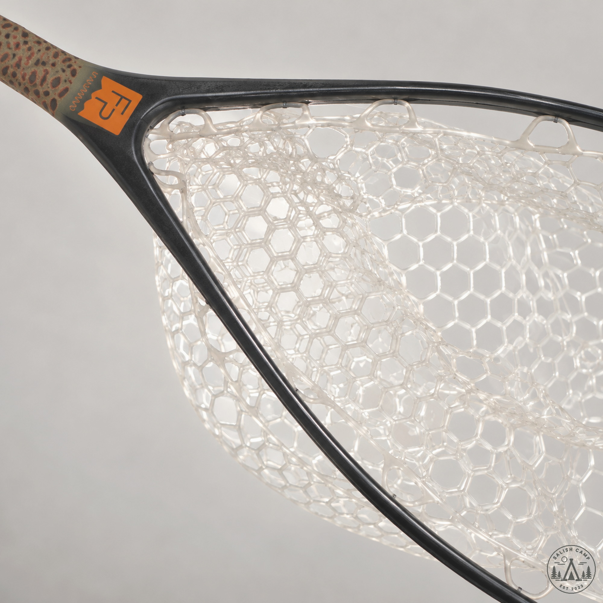 Yampa Hand Net 2.0 clear TPU bag at the hoop rim